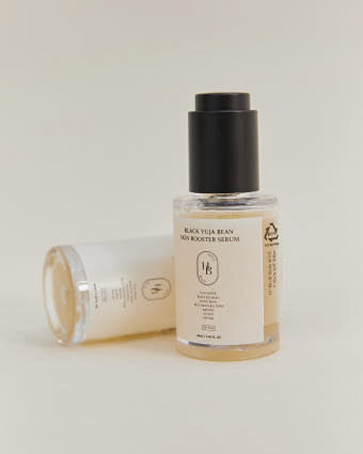 HEVEBLUE Black Yuja Bean Skin Booster Serum 42ml - tonal render